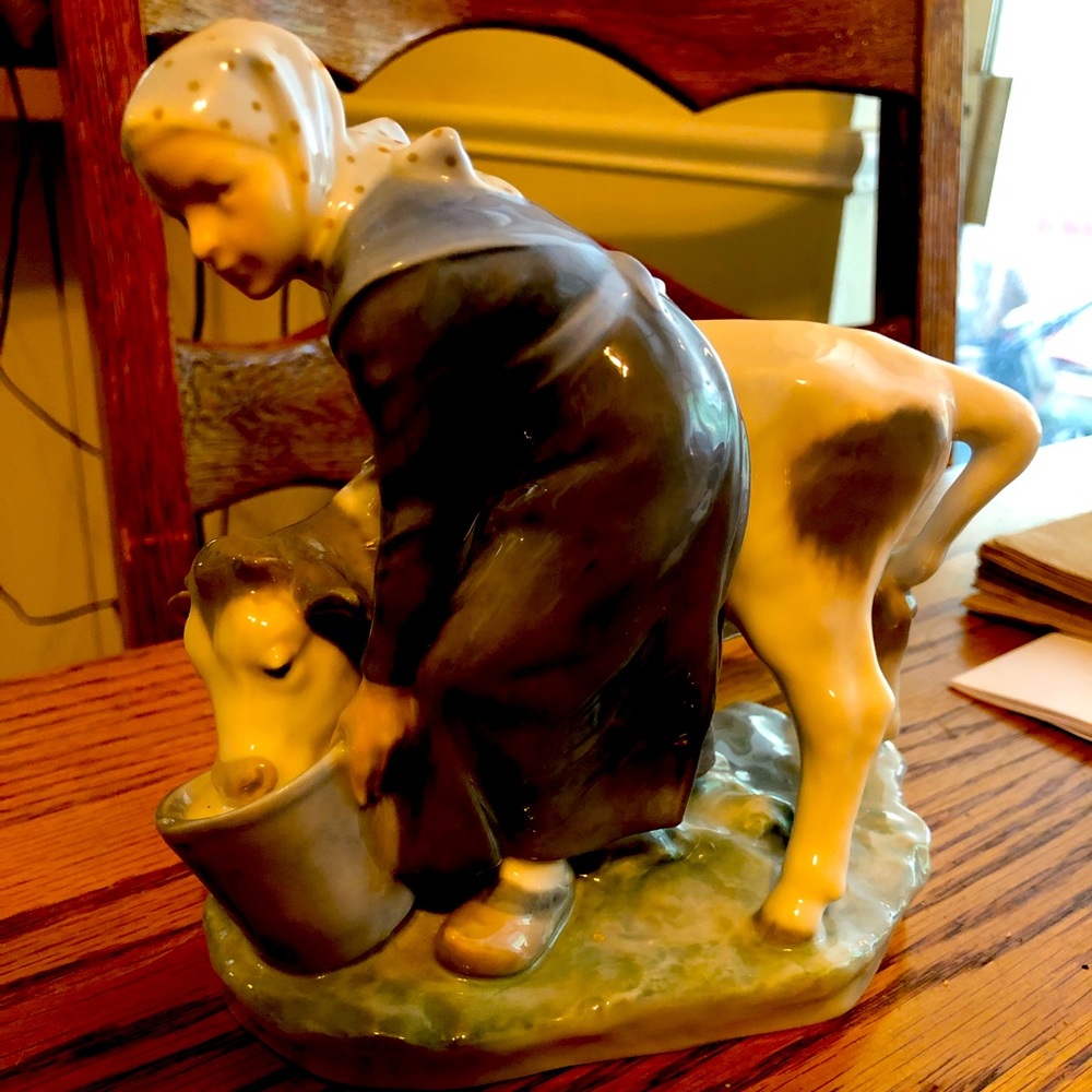 Cow Drinking Milk